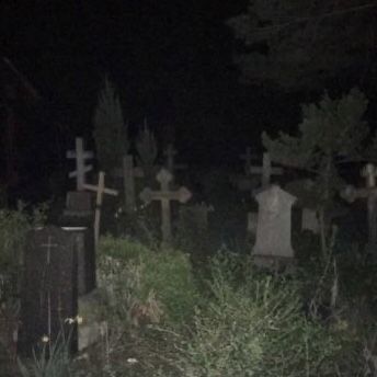 a graveyard at night